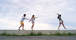 A group of happy diverse friends having fun together while on holiday