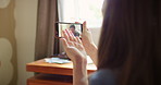 A happy young couple waving during a video call made using a mobile phone