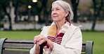 Relax, thinking and a senior woman at the park for summer, ideas or retirement vision. Smile, remember and an elderly person on a bench in nature with inspiration, memory or outdoor reflection