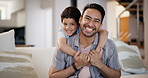 Face, father and son hug for support in home for care, safety or bonding together to relax on sofa. Smile, love or happy single parent dad with fun kid for security, joy or boy child in family house