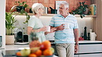 Senior couple, drinking coffee and communication in kitchen, bonding and relaxing together. Elderly people, tea and beverage in morning routine, conversation and happy love in retirement at home