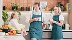 Parents, kid and happy in kitchen with coffee, conversation and relax together with bonding, love and care. Father, mother and daughter with tea, drink and talk for chat, connection and family home