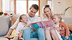 Parents, girl children and book on couch for reading, learning and development with care, love and bonding. Mom, dad and kids with storytelling with teaching, support and talk on lounge sofa in house