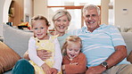 Face, grandparents and children on sofa in home for bonding, relationship and relax together. Family, living room and portrait of grandpa, grandma and kids for love, care and generations on couch