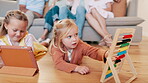 Children, girls and playing with games in living room of home for child development and creative fun with abacus. Family, kids and sisters with toys on floor for math, learning and tablet in lounge 