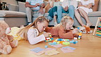 Children, girls and playing with building blocks in living room of home for child development and creative fun. Family, kids and sisters with toys on floor for games, learning and bonding in lounge 