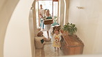 Moving, parents and excited children in new home with toys, cardboard and mortgage on property investment. Mother, father and kids together at front door house with boxes, teddy bear and real estate.