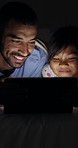 Smile, father and child on tablet in home at night, learning or conversation of family bonding together. Happy dad, kid and digital technology to watch video, cartoon or education on app in bedroom