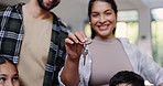 Hands, family and keys to new home for goals, target or investment and milestone celebration closeup. Growth, smile or happy with mother, father and children proud of property or real estate purchase