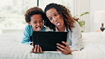 Tablet, selfie and mother and son on a bed with crazy, expression or tongue out gesture in their home. Love, family and African mom with kid in a bedroom for digital, photography and profile picture