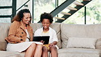 Happy mother, child and tablet on sofa for entertainment, online streaming or social media at home. African mom, kid or little boy smile with technology for bonding, movie or relax in living room