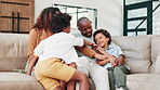 Happy, tickling and parents with kids on sofa having fun, bonding and relaxing together at home. Laughing, love and top view of boy children playing with mother and father in living room at house.