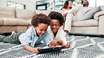 Boy, children and smile on carpet with tablet for educational gaming, online video search and internet scroll in home. Family, siblings and touchscreen on floor of living room for relax and streaming