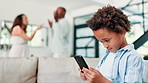 Frustrated couple, child and phone in conflict, disagreement or argument in living room at home. Mother, father and little boy on mobile smartphone while parents fight in divorce, breakup or affair