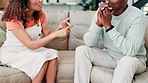 Frustrated couple, hands and argument on sofa in disagreement, conflict or divorce in living room at home. Closeup of angry man and woman in toxic relationship, cheating affair or drama on couch