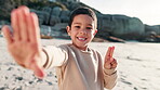 Young child, selfie and happiness on face on beach, relax and peace sign on summer vacation. Little boy, smile and portrait with gestures on holiday, leisure and travel adventure in nature by seaside