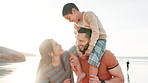 Beach, parents and child on shoulders of father for adventure, playing or bonding together. Happy, sunset and boy kid with young mom and dad by ocean on tropical vacation, holiday or weekend trip.