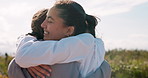 Smile, nature and girl friends hugging for good news, celebration or achievement together. Happy, excited and young women embracing with love, care and friendship in outdoor field at countryside.