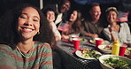 Happy people, friends and selfie at night for party, dinner or outdoor event on bench. Group smile in diversity for photograph, picture or memory together by dining table in late evening in America