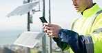 Man, phone and hands typing for communication, social media or solar panel research on rooftop. Closeup of person, contractor or technician on mobile smartphone for online networking or photovoltaic