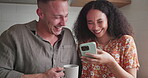 Couple, home and laughing for social media on phone, happy and relaxing together for bonding. People, drinking coffee and mobile application for online humor, comedy and love in relationship or fun