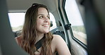 Thinking, smile and young woman in a car on a road trip for adventure, journey or vacation. Happy, reflection and female person from Australia with memory by window in vehicle for holiday transport.