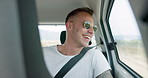 Happy man, car and sunglasses on road trip in backseat for travel, journey or adventure in the countryside. Male person smile in joy looking out vehicle window for natural scenery, holiday or weekend