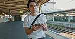 Man, check phone and waiting at train station with reading, thinking and location with digital schedule. Man, travel and smartphone for transportation app, time management or map for tourism in Japan