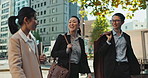 Asian, business people in city and travel, talking and walking with commute to work, conversation and bonding. Journey on urban street, friends chat with communication and happy commuting together