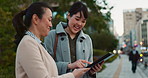 Asian woman, tablet and team on sidewalk in city for communication, research or social media. Business people smile with technology for online search, chat or networking on pavement in an urban town