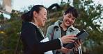 Asian woman, tablet and team in city for communication, research or social media together. Business people smile with technology for online search, chat or networking on pavement in an urban town