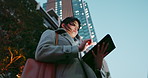 Asian woman, tablet and city for communication, research or social media by building in Japan. Female person or employee on technology for online search, chat or outdoor networking in an urban town