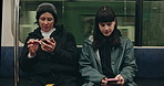 Train, phone and women in city for travel, commute and journey on metro transportation in town. Passenger, motion blur and people on smartphone for social media, internet and chat on public transport