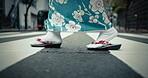 Japan, feet and walking in city in kimono, pedestrian crossing and woman in street for heritage. Person, commuting and traditional clothes in tokyo religion and travel in slippers as culture fashion