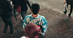 Travel, walking and woman in the busy city for sightseeing, adventure or journey on holiday. Street, outdoor and back of Japanese female person in kimono commuting in Tokyo town on weekend trip.
