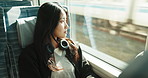 Japanese, train and woman on journey thinking about transportation or commute in Kyoto. City, metro and girl at window with audio headphones in town or relax on public infrastructure with technology