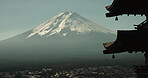 Landscape, drone and travel to mountain from temple in city and nature from ancient culture building. Fujiyoshida, Japan and skyline with architecture of spiritual location on vacation or journey