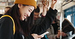 Train, phone and happy Japanese woman for travel, commute and journey on metro transportation in city. Passenger, public transport and person laugh on smartphone for social media, chat and contact