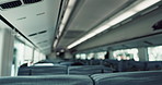 Empty train interior, seats and transport with moving, window and vehicle with public infrastructure. Locomotive, railway travel and chair for passenger commute, services and carriage in Tokyo