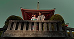 Man, woman and shinto temple and traditional clothes for culture, building or religion in sunshine. Person, ideas and vision for reflection with faith, mindfulness or buddhism with low angle in Japan