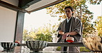 Shinto temple, man and wash hands at fountain, container or cleaning for worship with faith. Religion, mindfulness and person in purification ritual to stop evil, bacteria or ladle at shrine in Tokyo