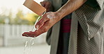 Shinto temple, person and washing hands at fountain with container for cleaning, faith and worship. Religion, mindfulness and purification ritual to stop evil, bacteria and peace at shrine in Tokyo