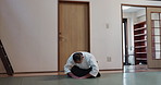 Japanese, man and sensei, bow for respect and tradition, greeting with aikido for discipline and exercise. Traditional, senior male in dojo or gym for fitness, martial arts and wellness with training