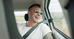 Man, car and road trip with laugh by window with thinking, ideas and comic memory for vacation travel. Guy, person and happy in vehicle with smile to remember funny story with driving on holiday