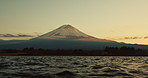 Water, mountain and waves in sunset with blue sky, clouds and outdoor natural scenery in Japan. Ripples, tide and eco friendly environment of nature, lake or view of greenery in countryside on mockup