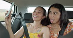 Woman, friends and selfie on road trip with smile, tongue and funny face with adventure in car. Girl, photography and kiss with care, journey or holiday with memory, profile picture or transportation