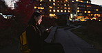 Happy asian woman, phone and night for networking, outdoor communication or social media in city. Female person relax on mobile smartphone in late evening for online chatting in urban town of Japan