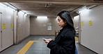 Japanese woman in subway walking with phone, internet and connection on morning commute. Search, schedule and travel, Asian girl in metro checking email or post on smartphone app on journey in Tokyo.