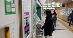 Woman, ATM and bank with card for money, click or press buttons for option, choice and decision in Tokyo. Japanese person, girl and machine for banking service, cash and walking with bag on travel