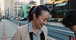 Japanese businesswomen, bow and talking of work, morning respect and corporate culture on sidewalk in city. People, professional workers and traditional greeting on street for communication in town